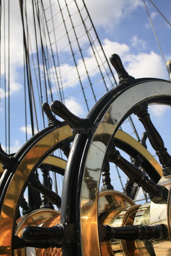 Steering wheel of HMS Warrior steam historical warship. Picture taken in Portsmouth UK on 11 â€ŽSeptember â€Ž2009. Steering wheel of HMS Warrior steam historical warship. Picture taken in Portsmouth UK on 11 â€ŽSeptember â€Ž2009