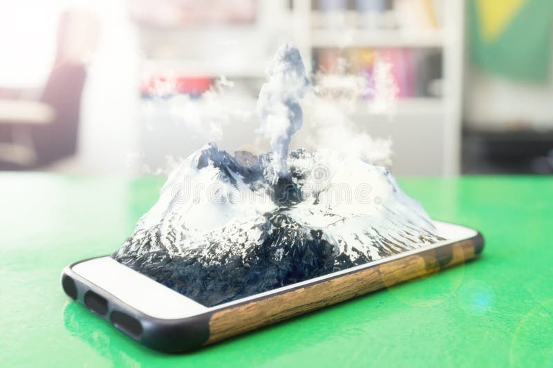 Vulcano in eruzione venuta fuori lo schermo di uno smartphone.