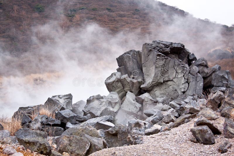 Volcano sulfur steam pit and rock stock image Volcano sulfur steam pit and rock stock image