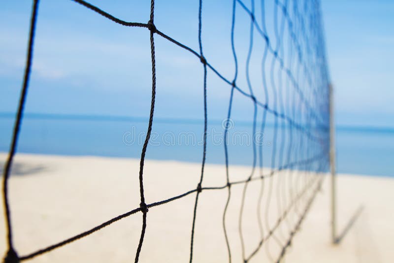 A volley ball net on the beach