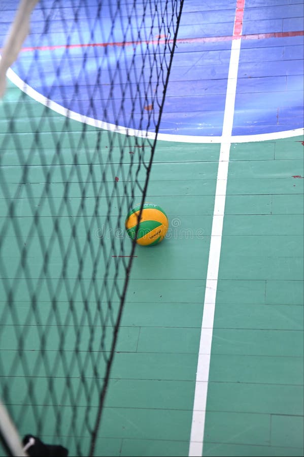Volleyball Ball On The Court Under The Volleyball Net Editorial Stock volleyball-ball-on-the-court-under-the-volleyball-net-editorial-stock