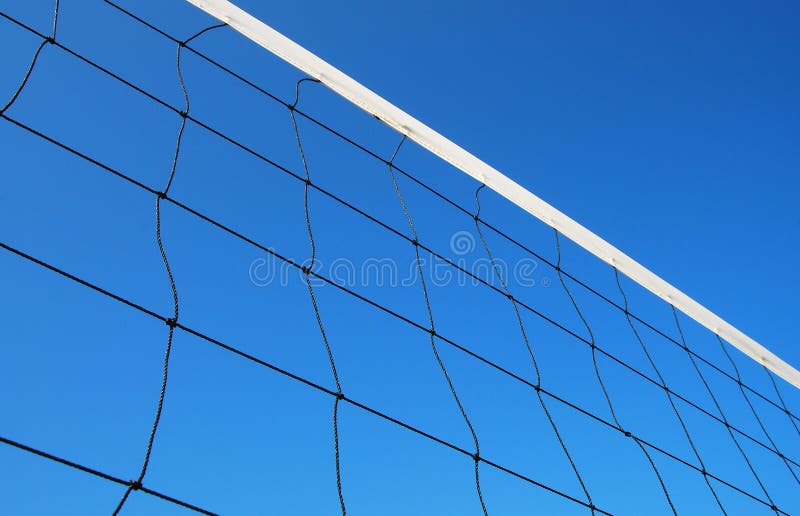 Volleyball net on the beach blue sky for background design