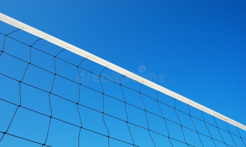 Volleyball net on the beach and blue sky for background design