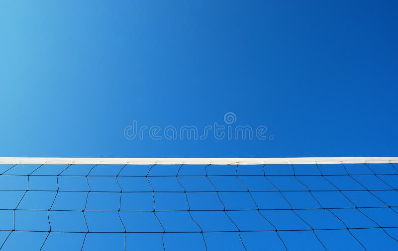 Volleyball net on the beach and blue sky for background design