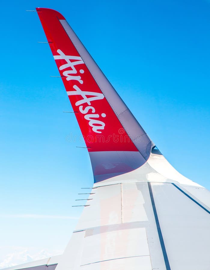 Volo Air Asia, vista dell'ala dall'aeroplano A320 fotografia stock Volo Air Asia, vista dell'ala dall'aeroplano A320 fotografia stock