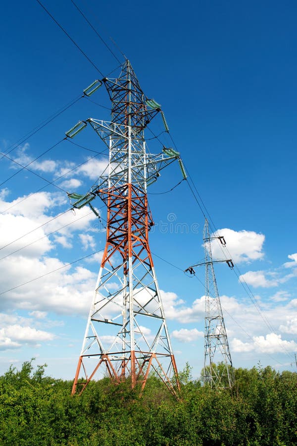 voltage poles high view day summer clouds bush