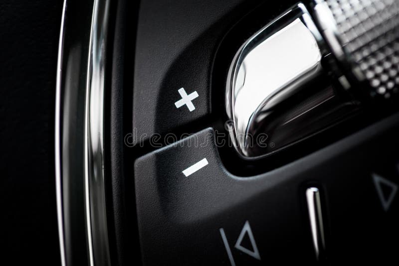 Volume Buttons in the Car on the Steering Wheel Image Stock Photo