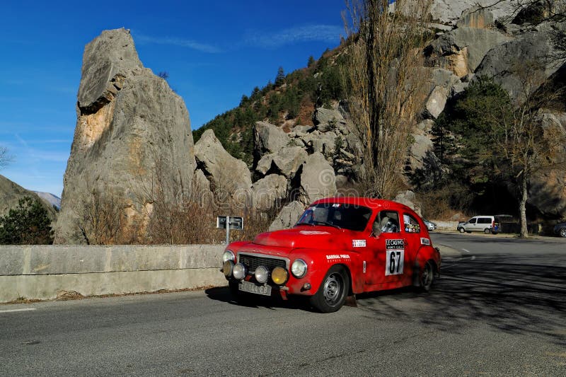 DIE, FRANCE, FEBRUARY 5, 2024. Classic swedish car Volvo PV 544 of 1965, during the 26th Rallye Monte-Carlo Historique of 2024, in southern France. DIE, FRANCE, FEBRUARY 5, 2024. Classic swedish car Volvo PV 544 of 1965, during the 26th Rallye Monte-Carlo Historique of 2024, in southern France.