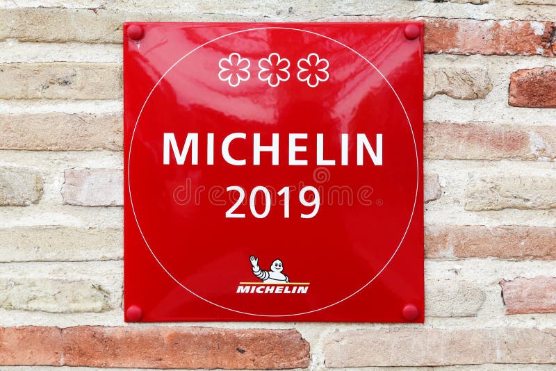 Michelin restaurant 3 stars symbol on a wall