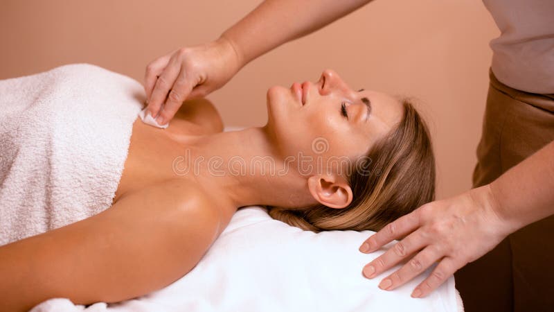 preparation of neck skin and decollete zone before procedure in beauty salon. Beautician hands clean skin. preparation of neck skin and decollete zone before procedure in beauty salon. Beautician hands clean skin