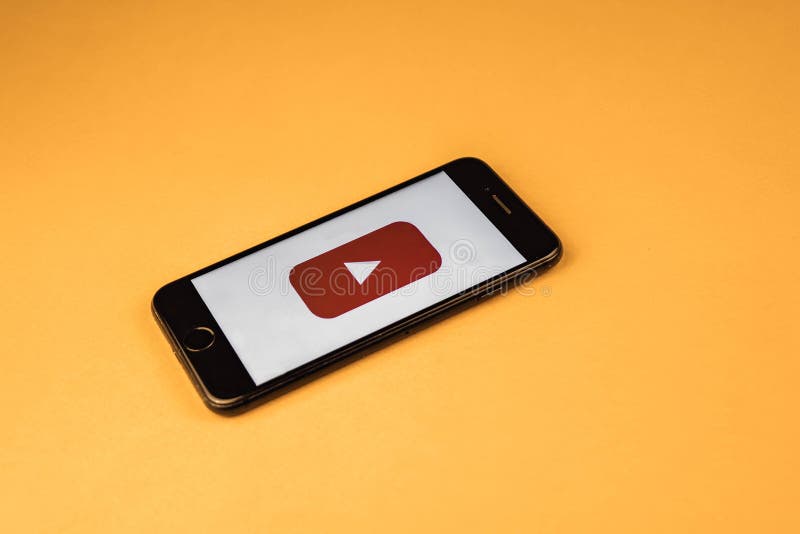 VORONEZH. Russia - may 03, 2019: Brand new Apple iPhone 7 with logo YouTube, on an orange background. YouTube is the popular stock photography VORONEZH. Russia - may 03, 2019: Brand new Apple iPhone 7 with logo YouTube, on an orange background. YouTube is the popular stock photography