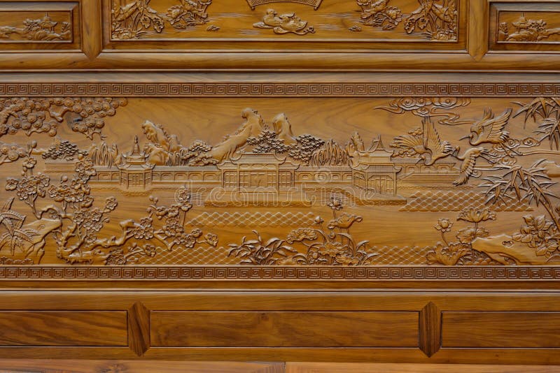 Vorzügliche Skulptur auf Holzmöbel in der chinesischen Trachtenmode lizenzfreies stockbild Vorzügliche Skulptur auf Holzmöbel in der chinesischen Trachtenmode lizenzfreies stockbild