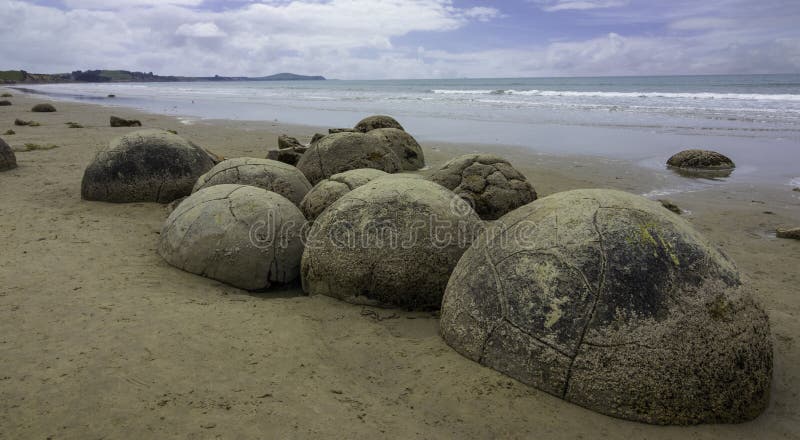 Voyage de jour de la Nouvelle Zélande de rochers de Moeraki photographie stock Voyage de jour de la Nouvelle Zélande de rochers de Moeraki photographie stock