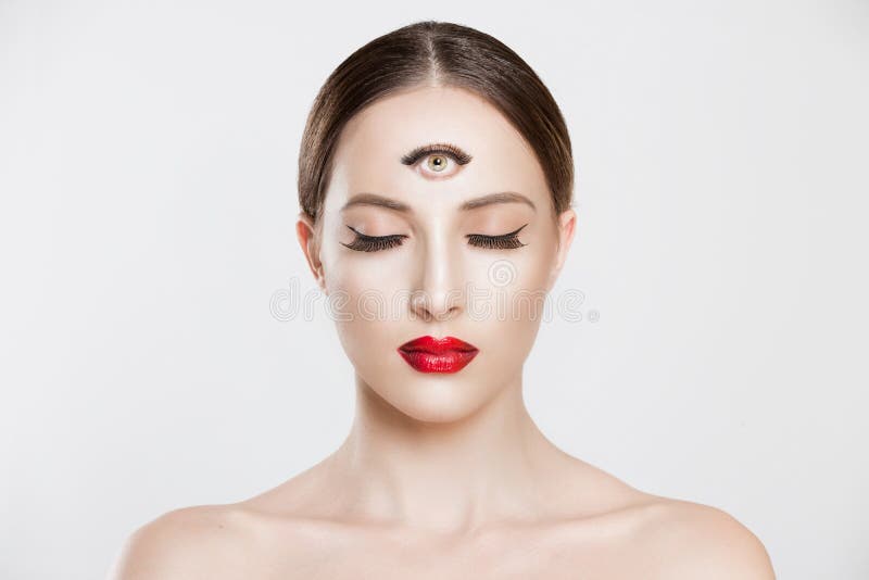 Psychic. Woman with 3 third eye looking at you camera concentrating thinking with mind and heart intuition about problem isolated white grey background. Making smart decision find solution concept. Psychic. Woman with 3 third eye looking at you camera concentrating thinking with mind and heart intuition about problem isolated white grey background. Making smart decision find solution concept