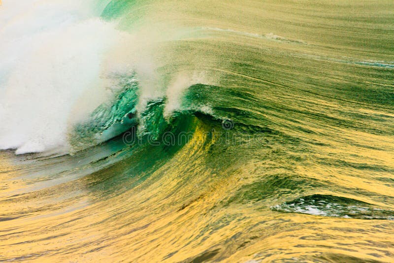 This image was captured from the pier in Oceanside, California. I had been taking photographs of surfers when I noticed the sunrise was creating nice golden colors on the waves. This image was captured from the pier in Oceanside, California. I had been taking photographs of surfers when I noticed the sunrise was creating nice golden colors on the waves.