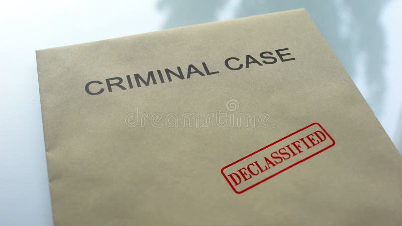 Criminal case declassified, seal stamped on folder with important documents, stock photo. Criminal case declassified, seal stamped on folder with important documents, stock photo