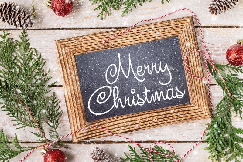 Vrolijke de Kaarthand van de Kerstmisvakantie het Van letters voorzien Kerstmis stock foto Vrolijke de Kaarthand van de Kerstmisvakantie het Van letters voorzien Kerstmis stock foto
