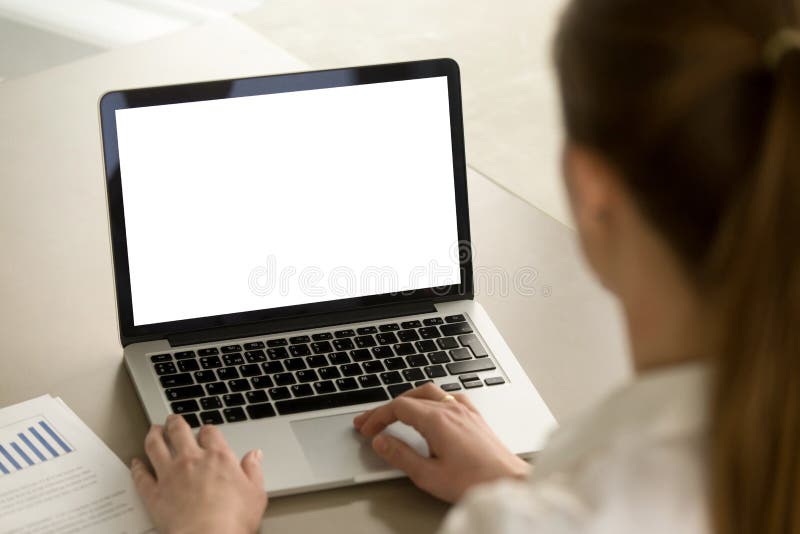 Businesswoman in office working on laptop with mockup blank screen. Empty copy space on monitor for business advertisement, corporate website, company financial report. Close up view, focus on screen. Businesswoman in office working on laptop with mockup blank screen. Empty copy space on monitor for business advertisement, corporate website, company financial report. Close up view, focus on screen.