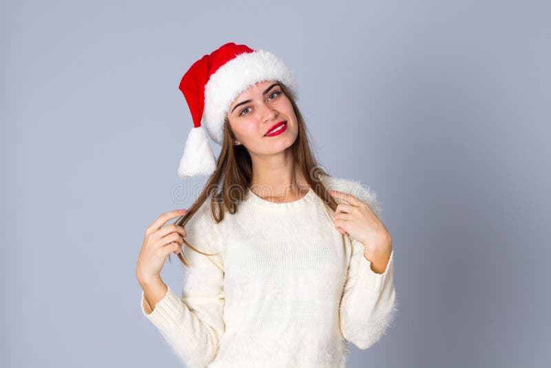 Vrouw in de rode hoed van Kerstmis royalty-vrije stock afbeelding Vrouw in de rode hoed van Kerstmis royalty-vrije stock afbeelding