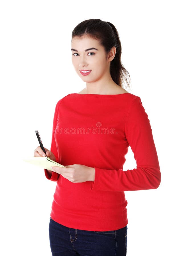 Vrouw het schrijven nota's en de planning van haar programma