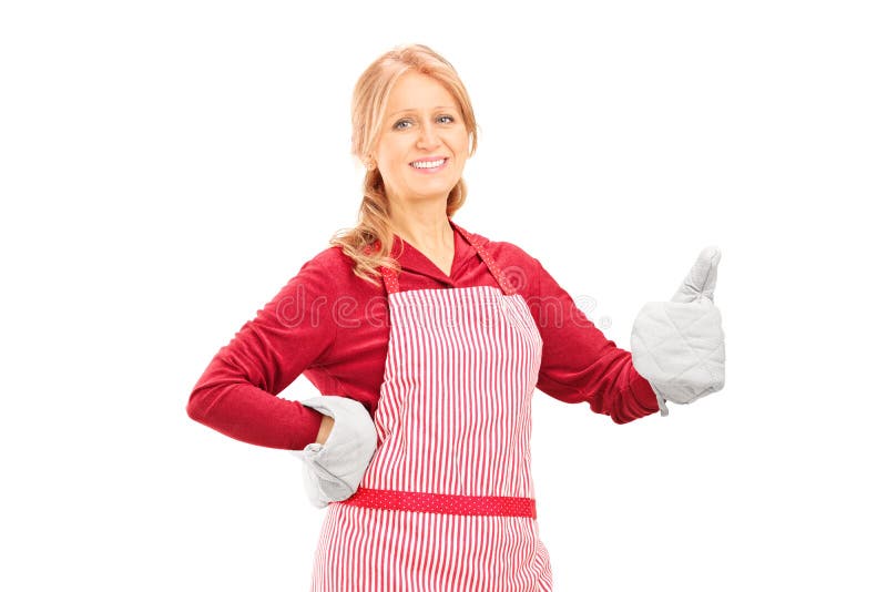 Vrouw met het koken van handschoenen die een duim opgeven stock afbeeldingen Vrouw met het koken van handschoenen die een duim opgeven stock afbeeldingen