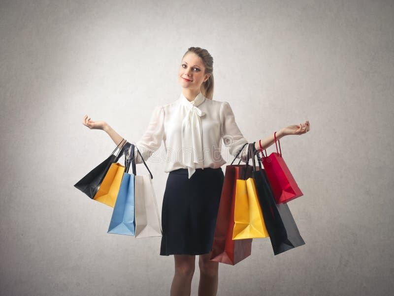 Vrouw met het winkelen zakken royalty-vrije stock afbeelding Vrouw met het winkelen zakken royalty-vrije stock afbeelding