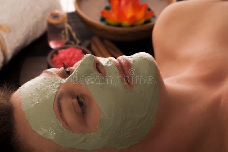 Portrait of a woman with spa mask on her face. Portrait of a woman with spa mask on her face