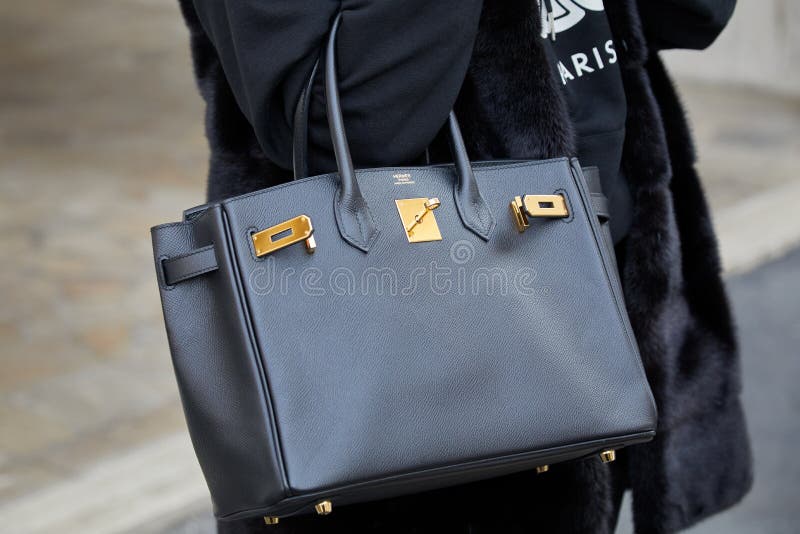 Woman with Black Louis Vuitton Bag with Golden Logo and Brown Jacket before  Gucci Fashion Show, Milan Fashion Editorial Photography - Image of stylish,  sunlight: 194554907