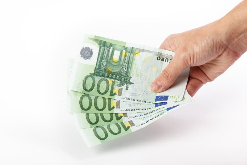 Vrouwelijke hand die 100 euro bankbiljetten houden royalty-vrije stock foto's Vrouwelijke hand die 100 euro bankbiljetten houden royalty-vrije stock foto's