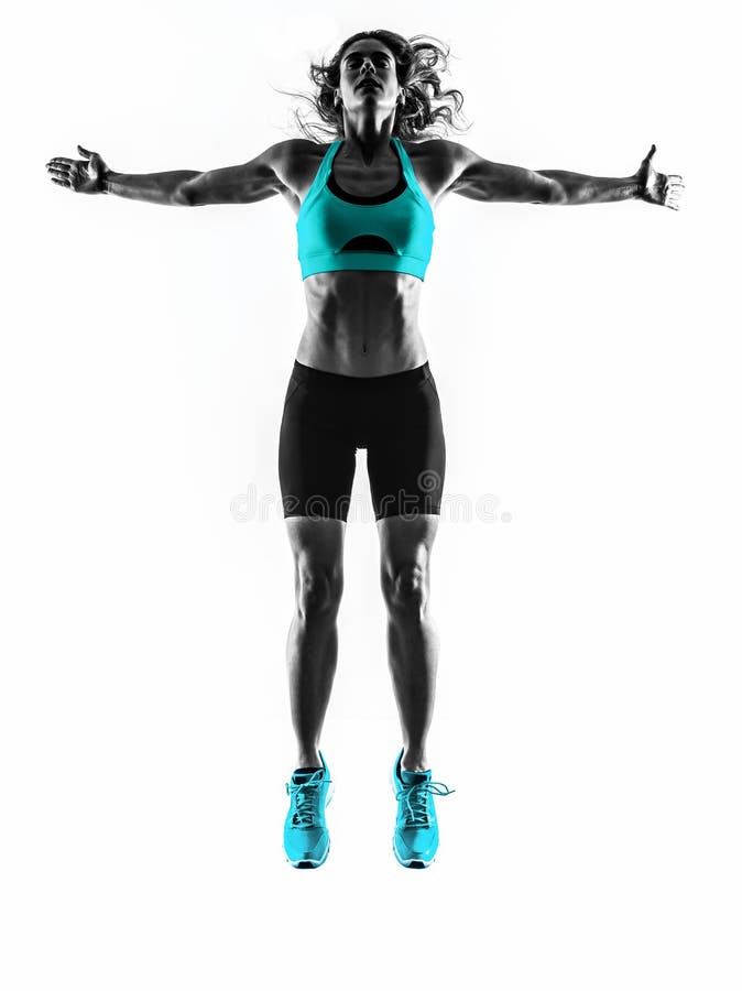 One caucasian woman exercising fitness jumping stretching in studio silhouette isolated on white background. One caucasian woman exercising fitness jumping stretching in studio silhouette isolated on white background