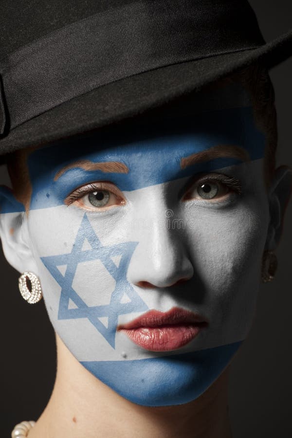 Vrouwengezicht met geschilderde Vlag van Israël royalty-vrije stock foto Vrouwengezicht met geschilderde Vlag van Israël royalty-vrije stock foto