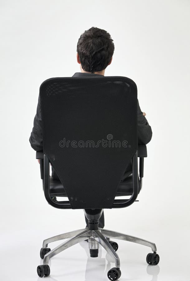 Vue arrière de l'homme sur la présidence photo libre de droits Vue arrière de l'homme sur la présidence photo libre de droits