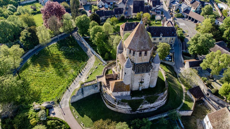 Aerial view of the Tour Csar (Caesar tower) in Provins, a medieval city in Seine et Marne, France - Octagonal dungeon with a square base on top of a hill. Aerial view of the Tour Csar (Caesar tower) in Provins, a medieval city in Seine et Marne, France - Octagonal dungeon with a square base on top of a hill