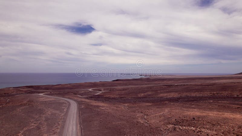 Vue Aérienne Sur Le Désert De Jandia Vers Faro Punta de Jandia banque de vidéos