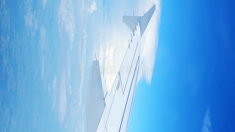 Vue d'une aile d'avion d'un hublot sur fond bleu ciel. un avion de transport vole au-dessus des nuages dans clips vidéos