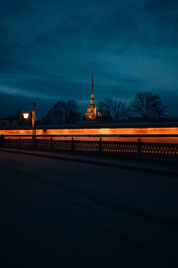 In Winter Saint Petersburg is the most beautiful city in Europe thanks to its historical and stunning architecture. The picture represents the fortress Peter and Paul at night. In Winter Saint Petersburg is the most beautiful city in Europe thanks to its historical and stunning architecture. The picture represents the fortress Peter and Paul at night