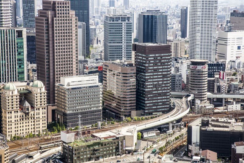 OSAKA, JAPAN - April 30, 2018: General view of populous Japanese megalopolis. OSAKA, JAPAN - April 30, 2018: General view of populous Japanese megalopolis