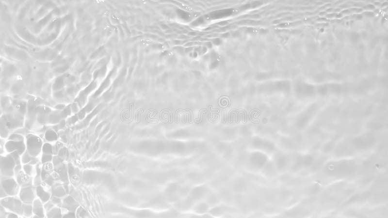 Vue rapprochée sur la texture de l'eau avec des vagues et des reflets lumineux. effet de superposition d'eau pour la vidéo maquett banque de vidéos