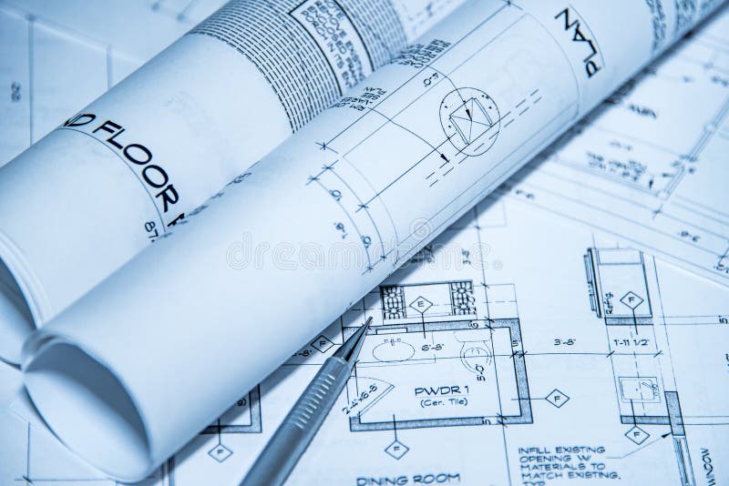 Vue supérieure de lieu de travail d'architectes des modèles Les projets architecturaux, modèles, modèle roule sur des plans avec photographie stock