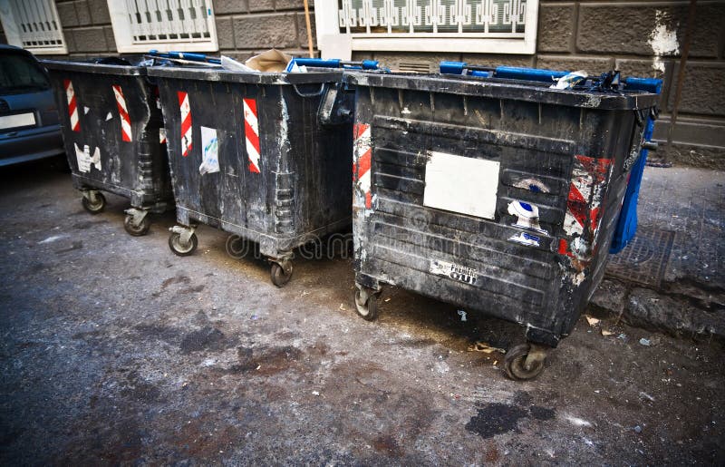 Dirty refuse bins. Street scene. Dirty refuse bins. Street scene.