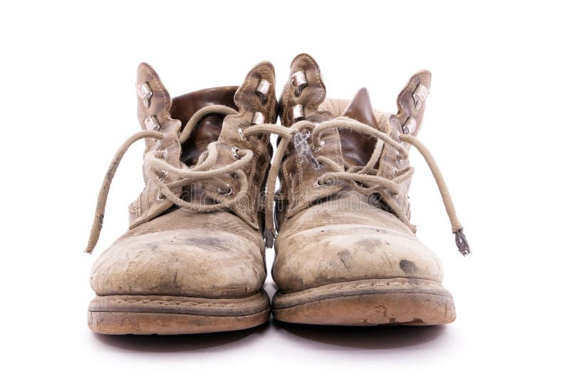 Vuile bruine laarzen stock afbeeldingen