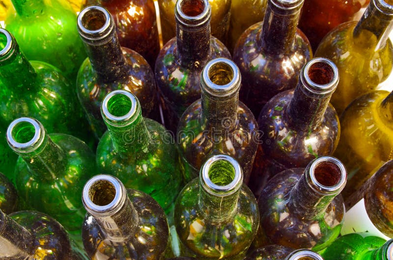 Close-up of colorful but dirty empty wine bottles. Close-up of colorful but dirty empty wine bottles