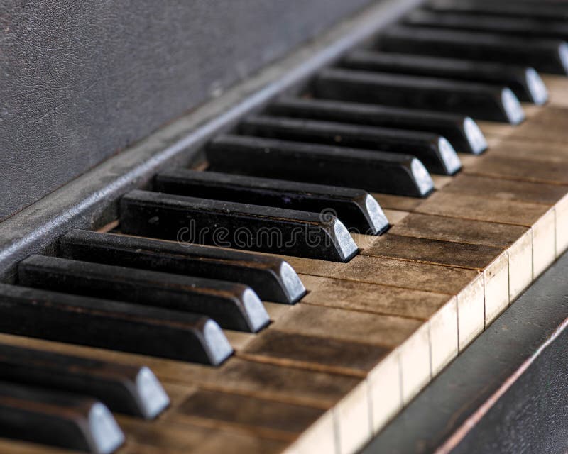 Closeup of dirty old piano keys. Closeup of dirty old piano keys