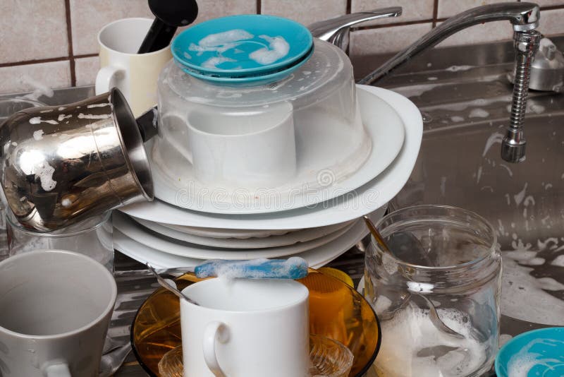 Shot of Dirty dishes ready for cleaning. Shot of Dirty dishes ready for cleaning