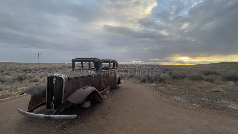 Classic vintage car as a landmark along Route 66 in Arizona, near the Petrified Forest Visitor Center. Classic vintage car as a landmark along Route 66 in Arizona, near the Petrified Forest Visitor Center