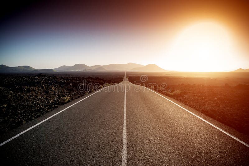 Empty asphalt road on a sunny summer day. Empty asphalt road on a sunny summer day