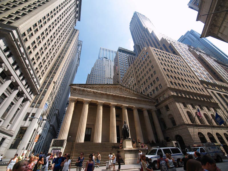 Manhattan - AUGUST 20, 2009: George Washington taking the inaugural oath, Federal Hall Wall Street, financial district, New York City. Federal Hall, built in 1700 as New York's City Hall, later served as the first capitol building of the United States of America under the Constitution, and was the site of George Washington's inauguration as the first President of the United States. It was also wh. Manhattan - AUGUST 20, 2009: George Washington taking the inaugural oath, Federal Hall Wall Street, financial district, New York City. Federal Hall, built in 1700 as New York's City Hall, later served as the first capitol building of the United States of America under the Constitution, and was the site of George Washington's inauguration as the first President of the United States. It was also wh