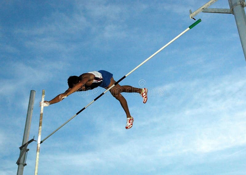 Pole-vaulter in flying action. Pole-vaulter in flying action