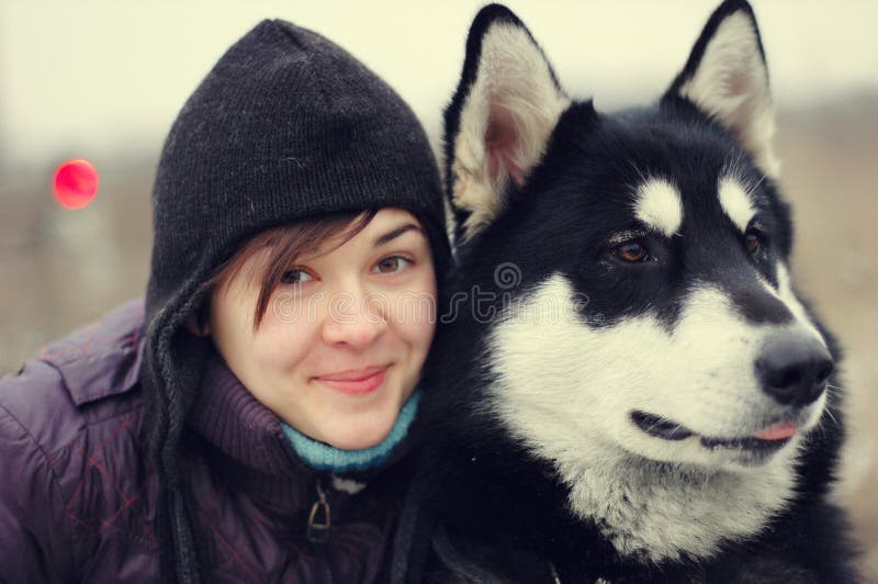 Outdoor portrait of the dog and girl. Outdoor portrait of the dog and girl