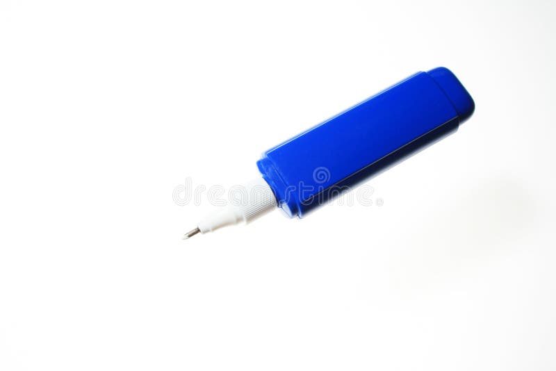 Liquid paper with blue color correction pen. Liquid paper with blue color correction pen